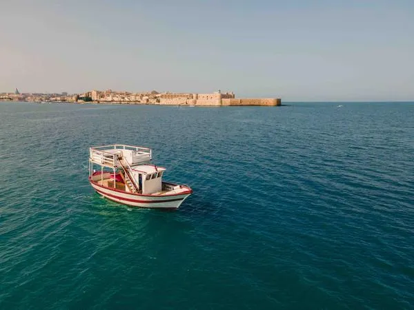 Escursione in barca al tramonto con aperitivo all'Isola di Ortigia