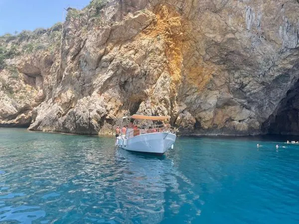Aperitivo in barca al tramonto con avvistamento delfini da Letojanni