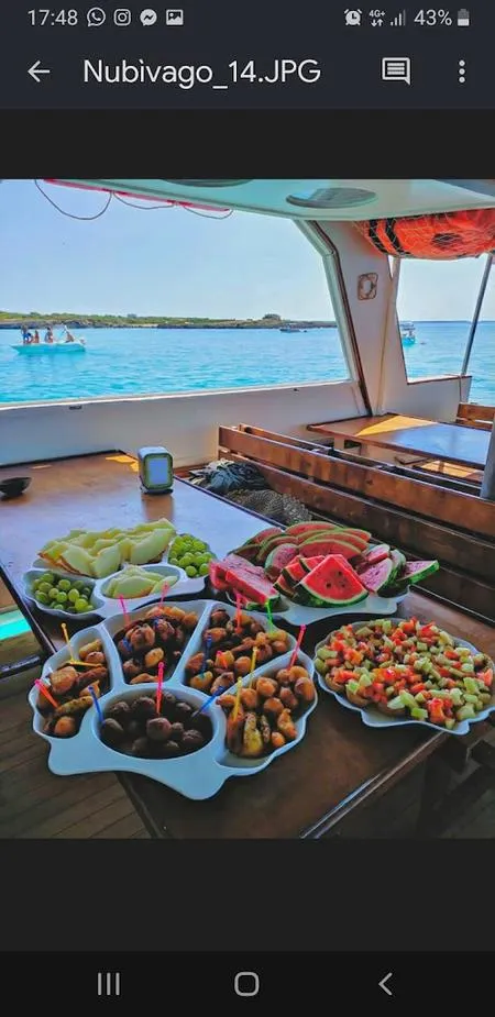 Aperitivo in barca al tramonto con soste bagno a Porto Cesareo