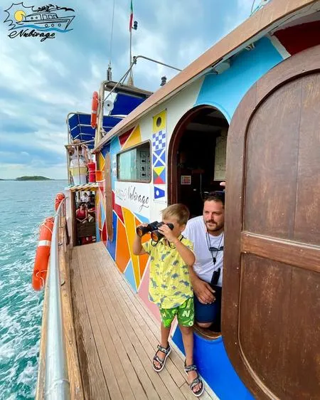 Aperitivo in barca al tramonto con soste bagno a Porto Cesareo