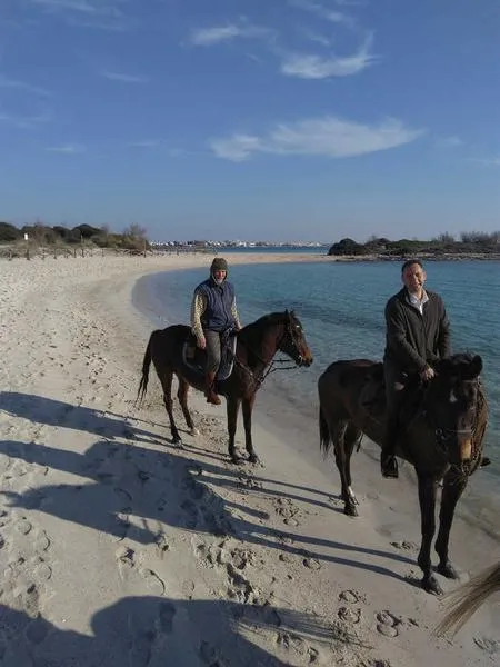 Passeggiata a cavallo in riva al mare a Porto Cesareo