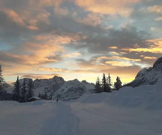 Giro in motoslitta e discesa in slittino alle Tre Cime di Lavaredo