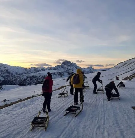 Giro in motoslitta e discesa in slittino alle Tre Cime di Lavaredo
