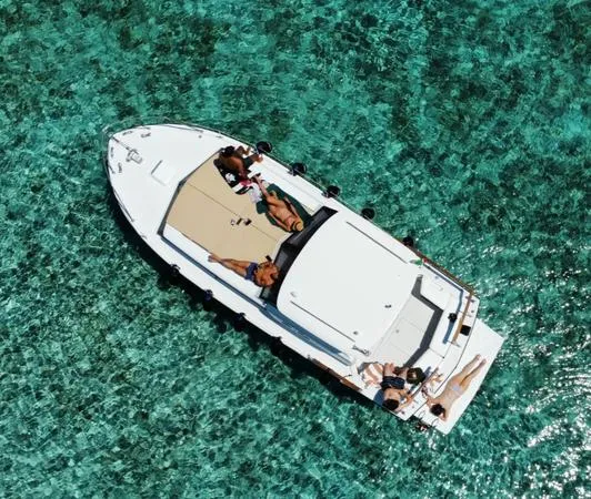 Giornata in motoscafo d’epoca con pranzo da Palau