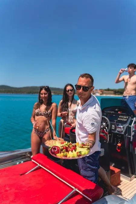 Gita di mezza giornata con soste bagno e aperitivo lungo la costa di Alghero